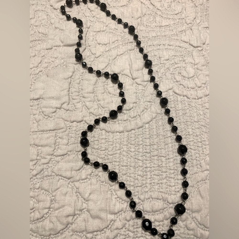 Long black beaded necklace